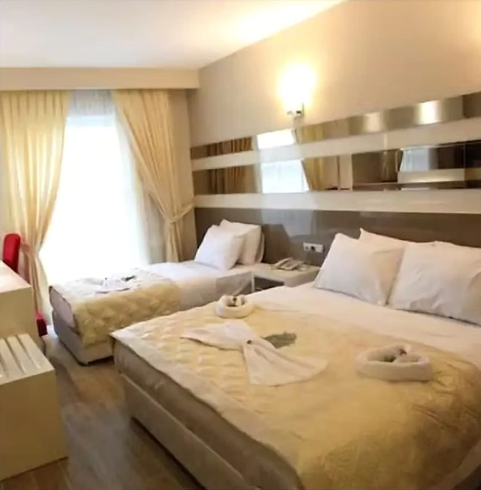 Üç Kişilik Oda
